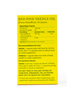 Close-up of Red Pine Needle Oil Capsules packaging with nutrition facts and dosage instructions on a yellow background.