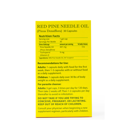 Close-up of Red Pine Needle Oil Capsules packaging with nutrition facts and dosage instructions on a yellow background.